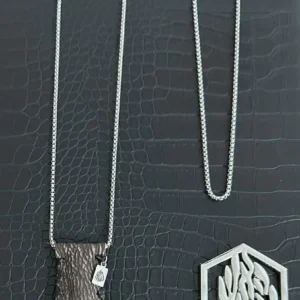 Petek Breslev mocha leather shark necklace jewish